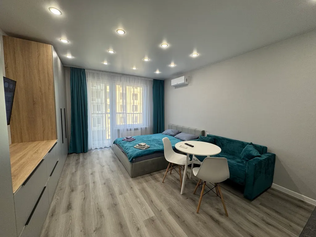 Уютная студия с видом на озеро