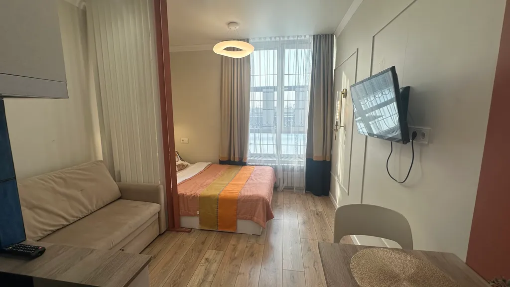 Уютная студия у станции метро в центре города