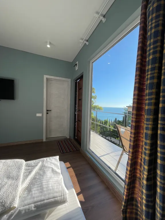 Квартира Квартира Стандарт с боковым видом на море — Гагра