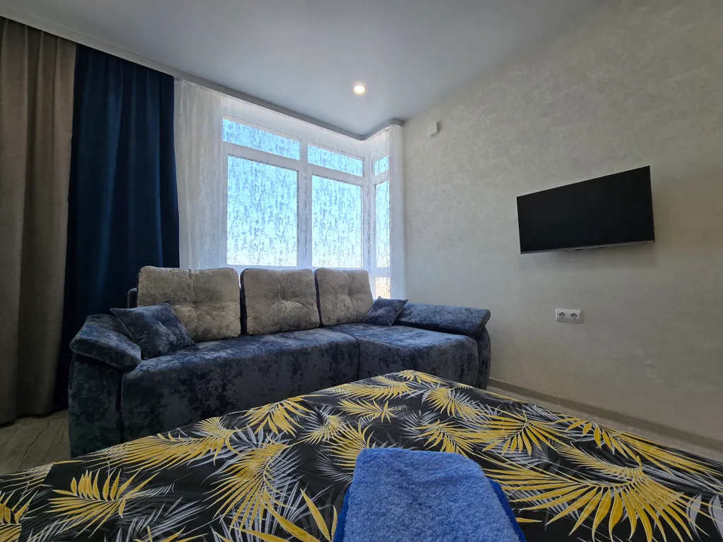 Уютная студия в элитном доме рядом с парком Ангелов