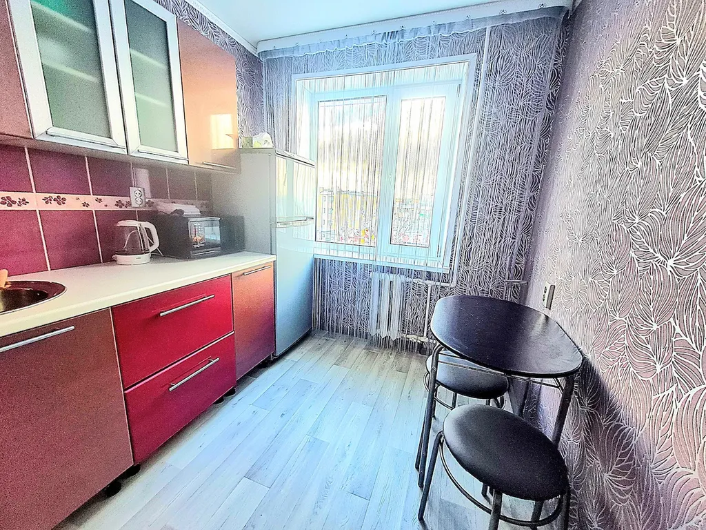 Квартрира с видом на закат солнца и горы