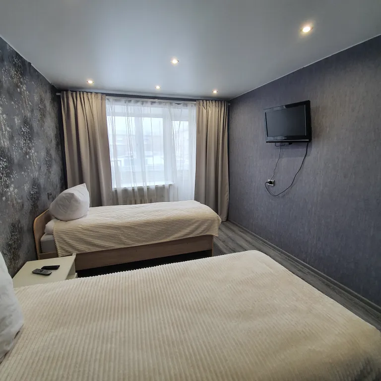 Уютная 2-комнатная квартира с раздельными спальнями в центре города