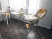 Кухня. Видно два разных детских стульчика для кормления. Есть еще два: трансформер и высокий стульчик без приставного столика.