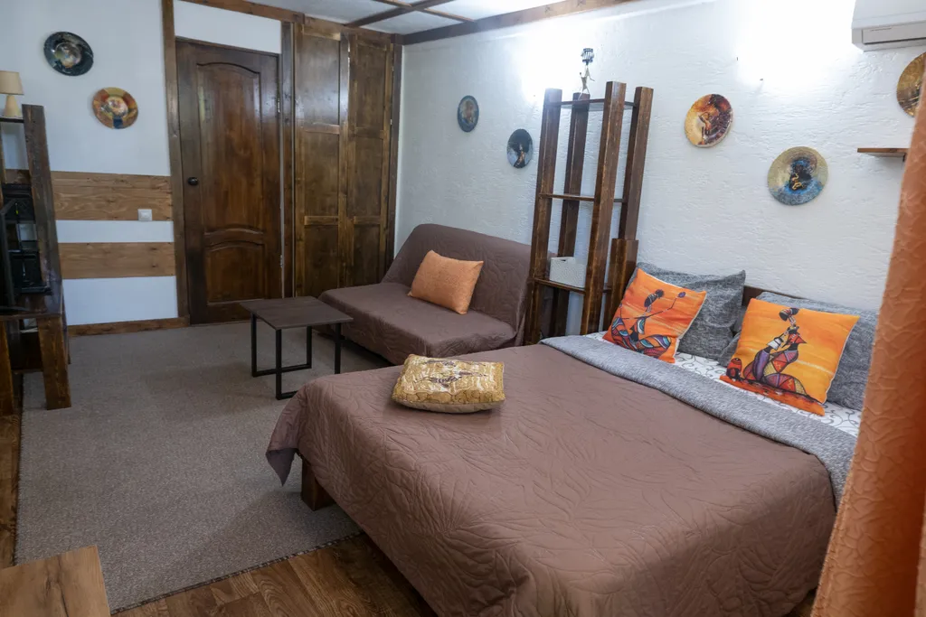 Квартира Квартира Четырёхместный номер с двухспальной кроватью и двухспальным диваном — Сухум