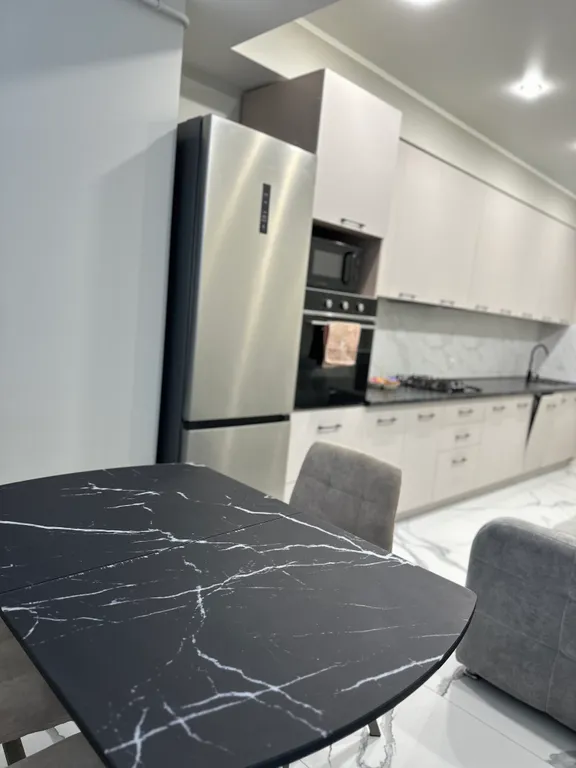 Уютная квартира в центре города с дизайнерским интерьером