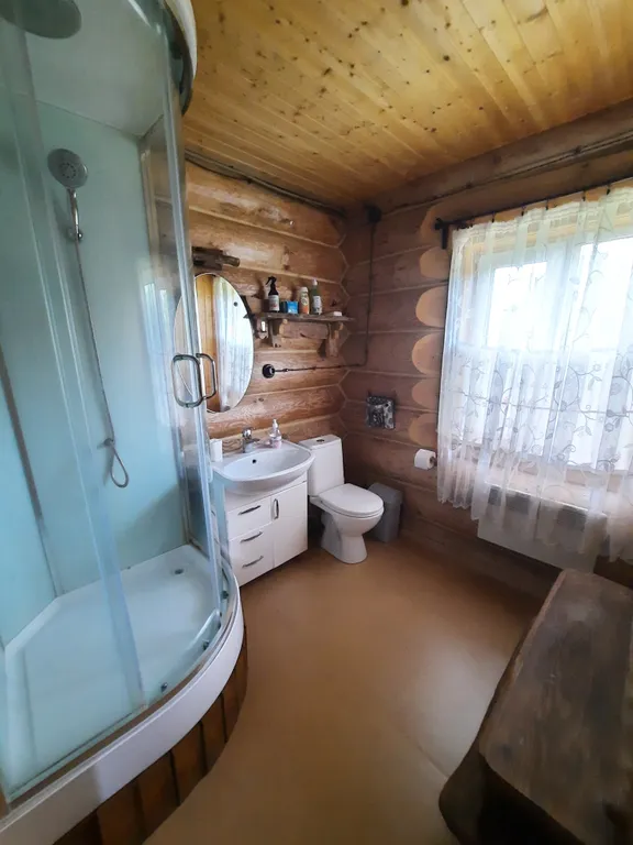 Гостевой дом в яблоневом саду из бревен Карельской сосны