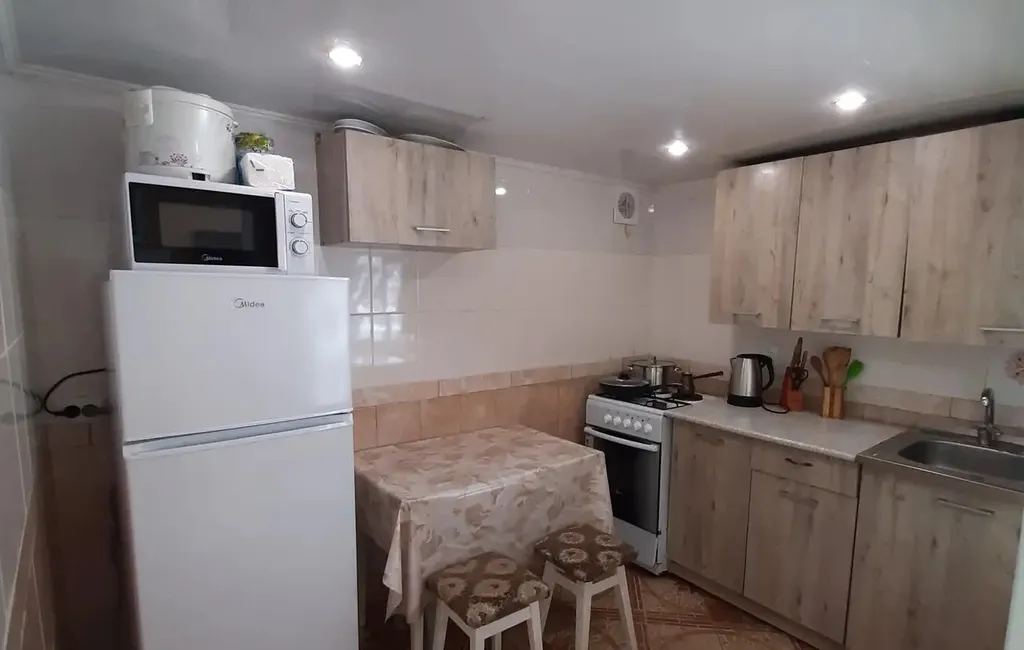 Дoмик с зеленым садом