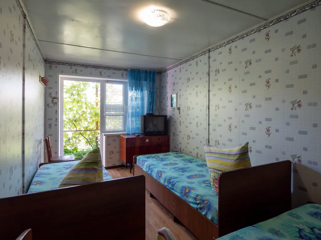 Комната в тени винограда