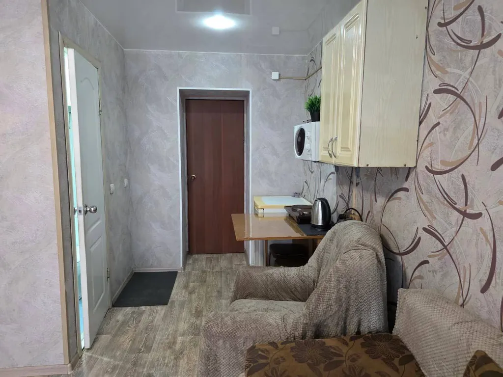 Комната-студия с балконом