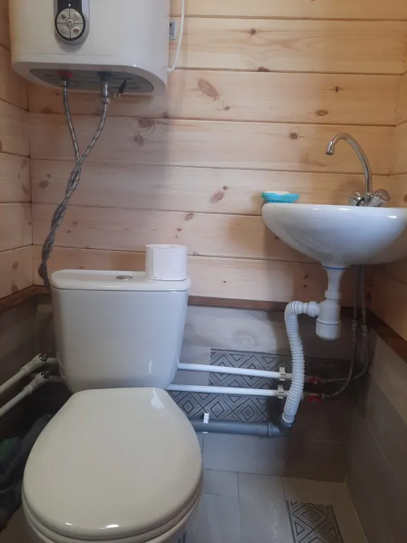 Уютный чистый дом с верандой на берегу реки Варзуга