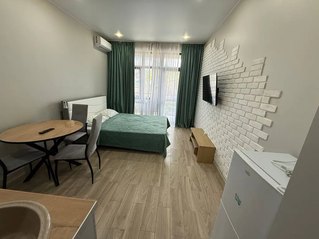 Апартаменты с двумя бассейнами на берегу моря