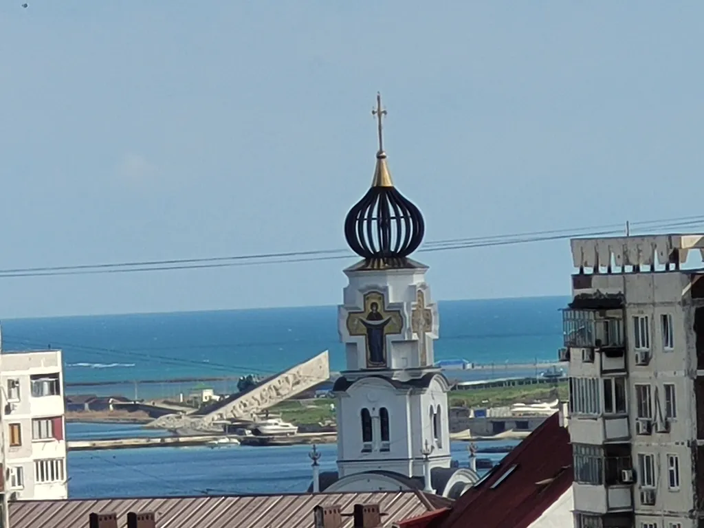 Уютная студия в центре города на берегу моря