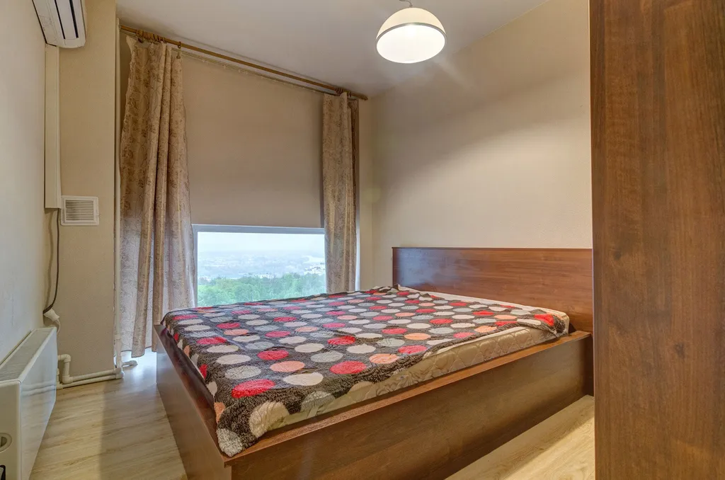 2-х этажные апартаменты с видом на город в Центре