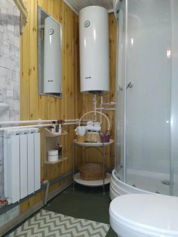 Уютный домик в деревне с выходом на веранду и ухоженным садом