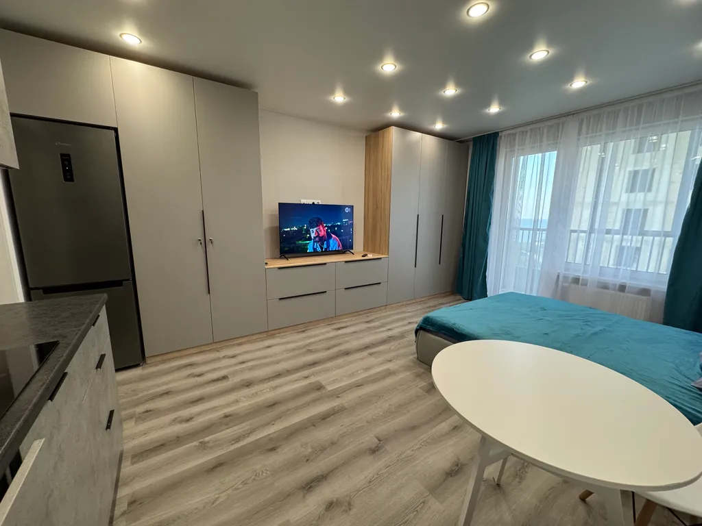 Уютная студия с видом на озеро