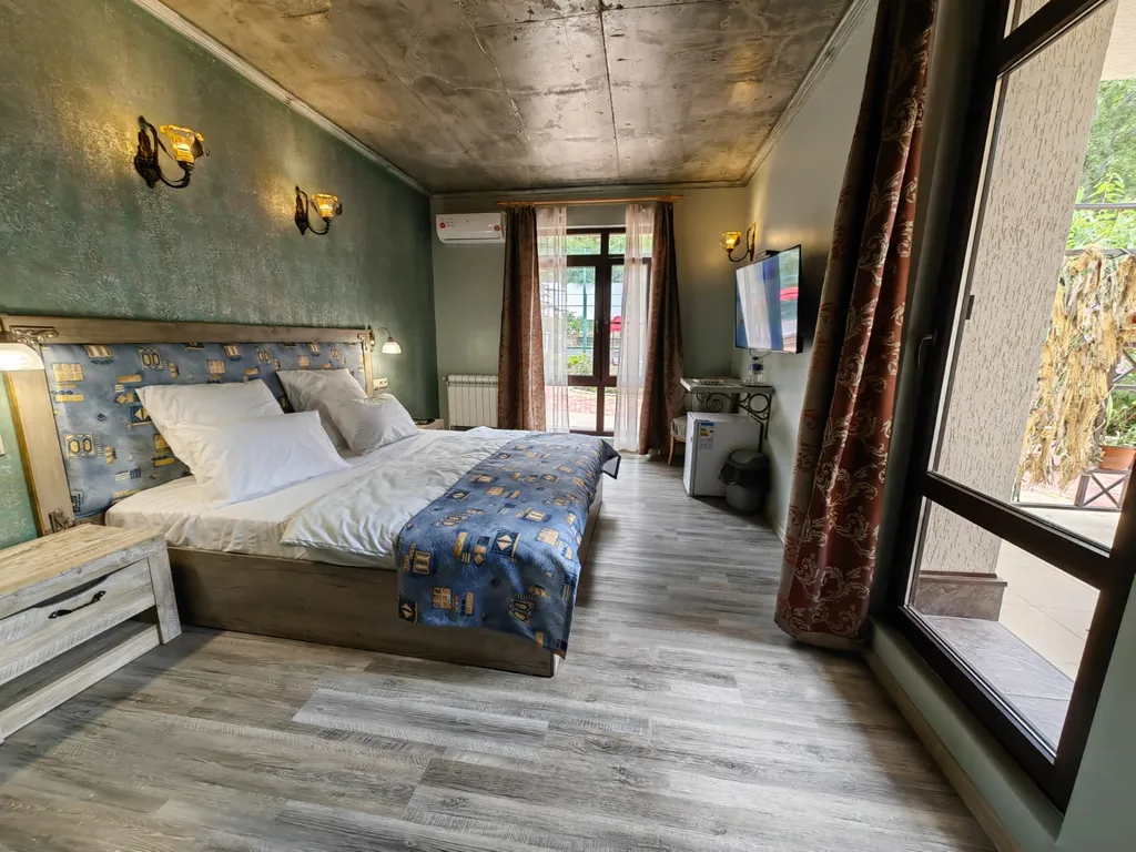 Уютный номер с видом на горы