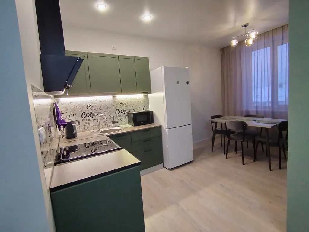 Квартира-студия с видом на город среди гор