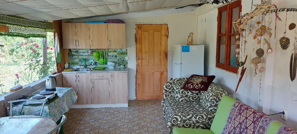 Дом утепленный в тихой местности, рядом горы и река