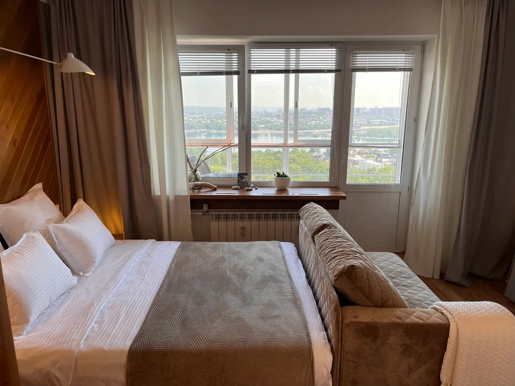 Уютнейшая студия с шикарным видом на панораму города и реку