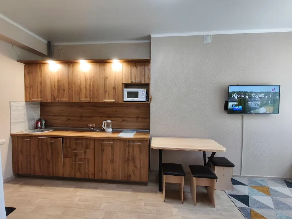 Квартира на берегу озера банное в лесной чаще из лиственниц