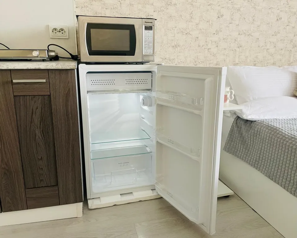 Квартира Квартира Уютная студия в Шушарах для командировочных, пар и пар с детьми — Шушары