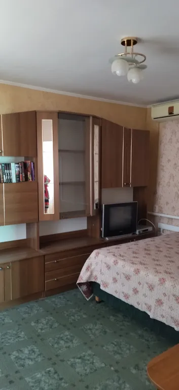 Небольшой гостевой дом со встроенной кухней на берегу моря