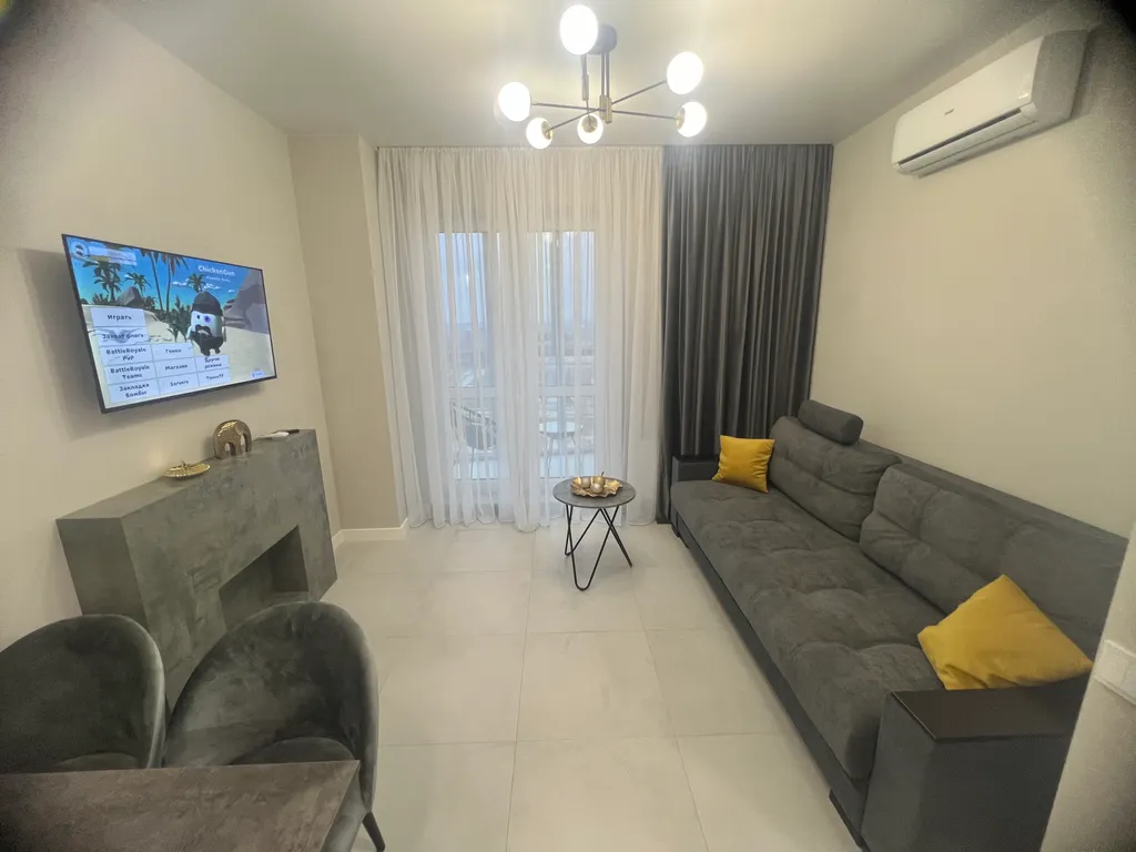 Уютная квартира в новом доме с видом на город