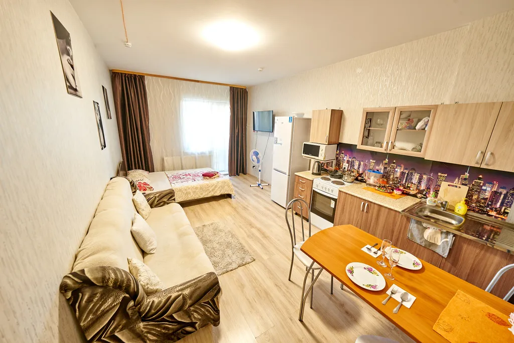 Современная студия с балконом на 21 этаже  в самом центре города