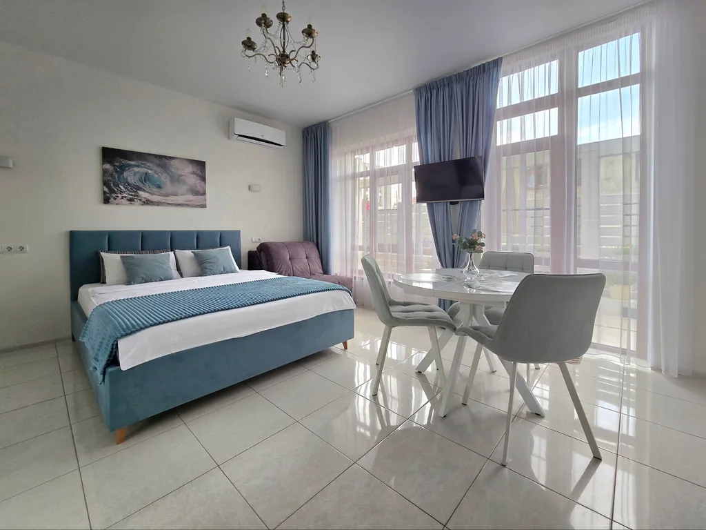 Квартира Квартира Уютная студия с выходом во дворик — Сириус