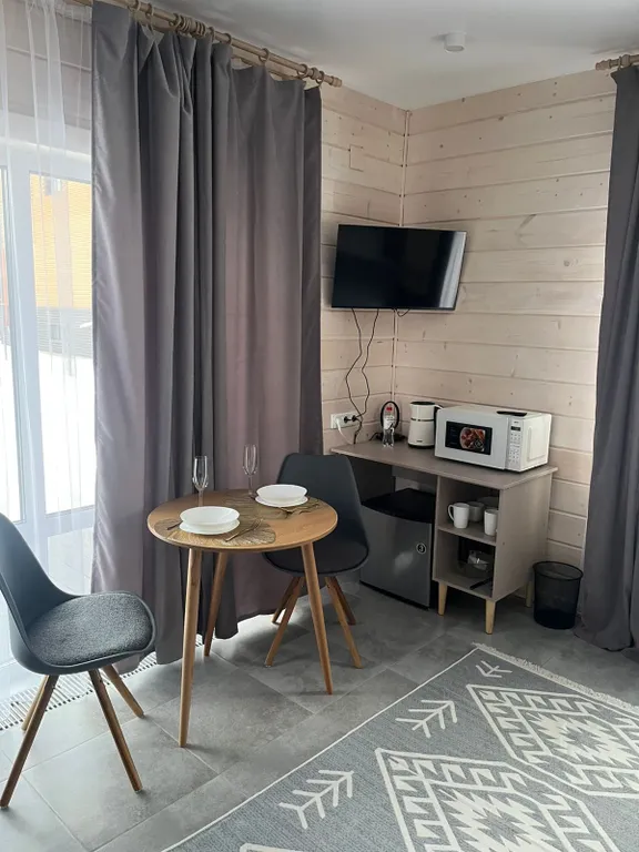 Уютная комната с выходом на террасу