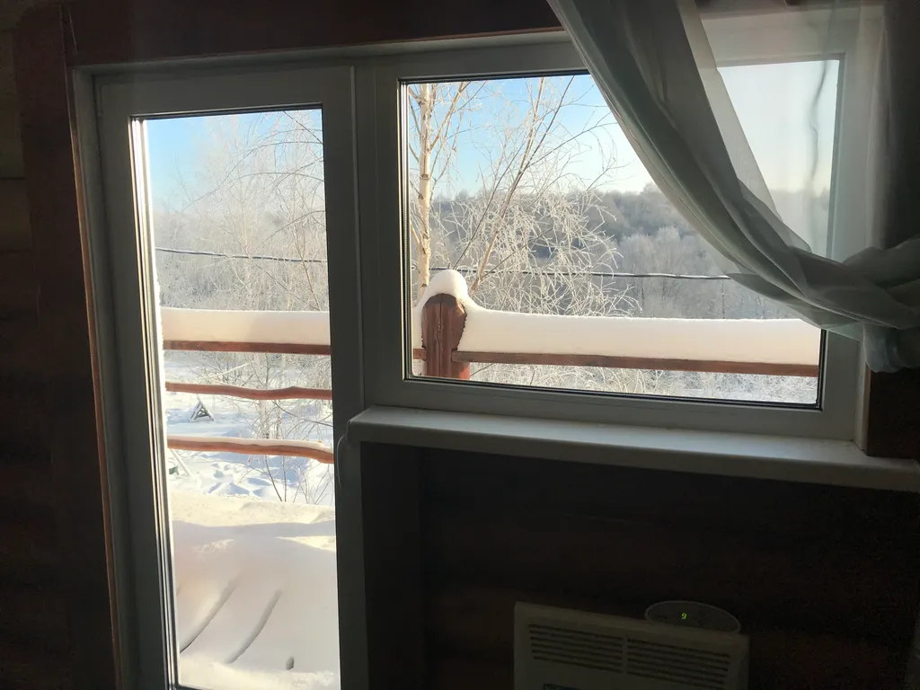 Дом из бревна Терем с сауной в черте города