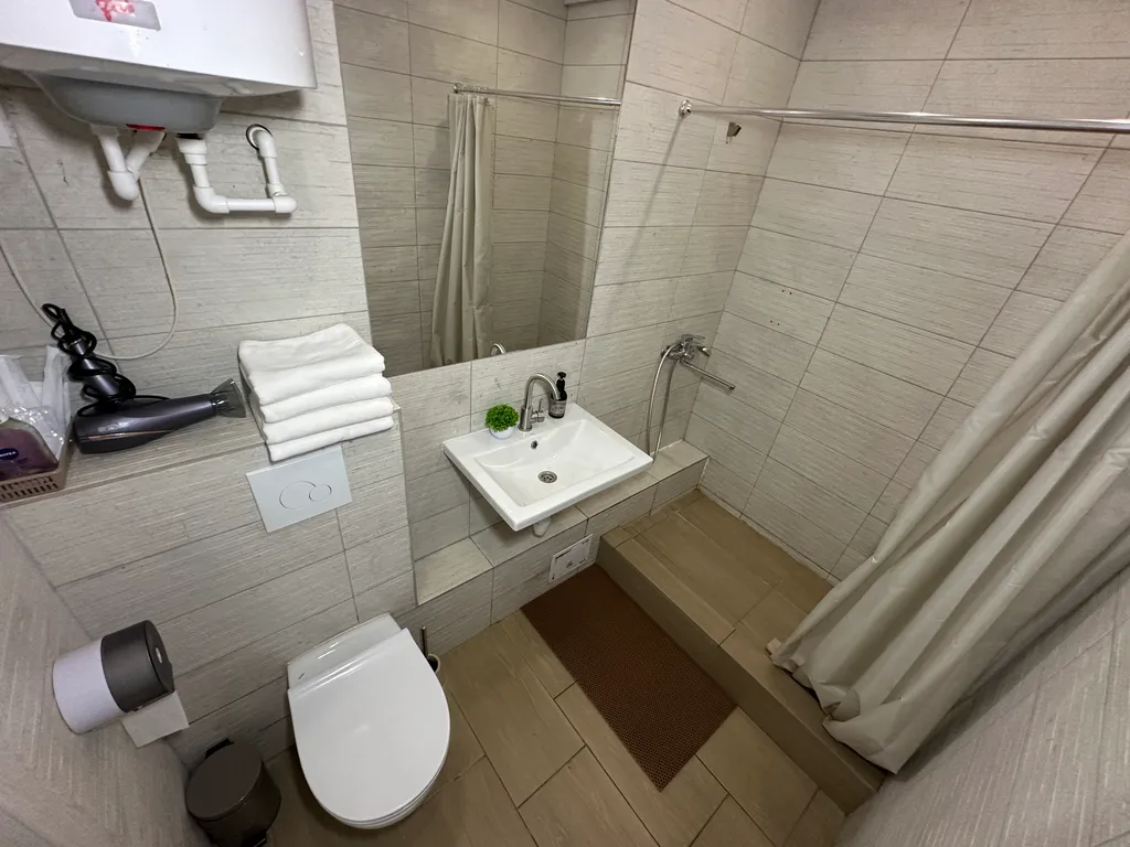 Двухэтажные апартаменты с балконом Столица 2313