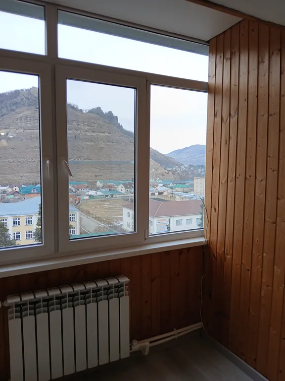 "Квартира в центре города с видом на горы"