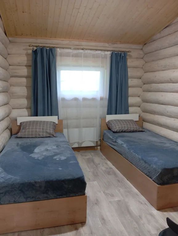 Меличуярви дом из бревна с сауной на берегу озера у самого леса