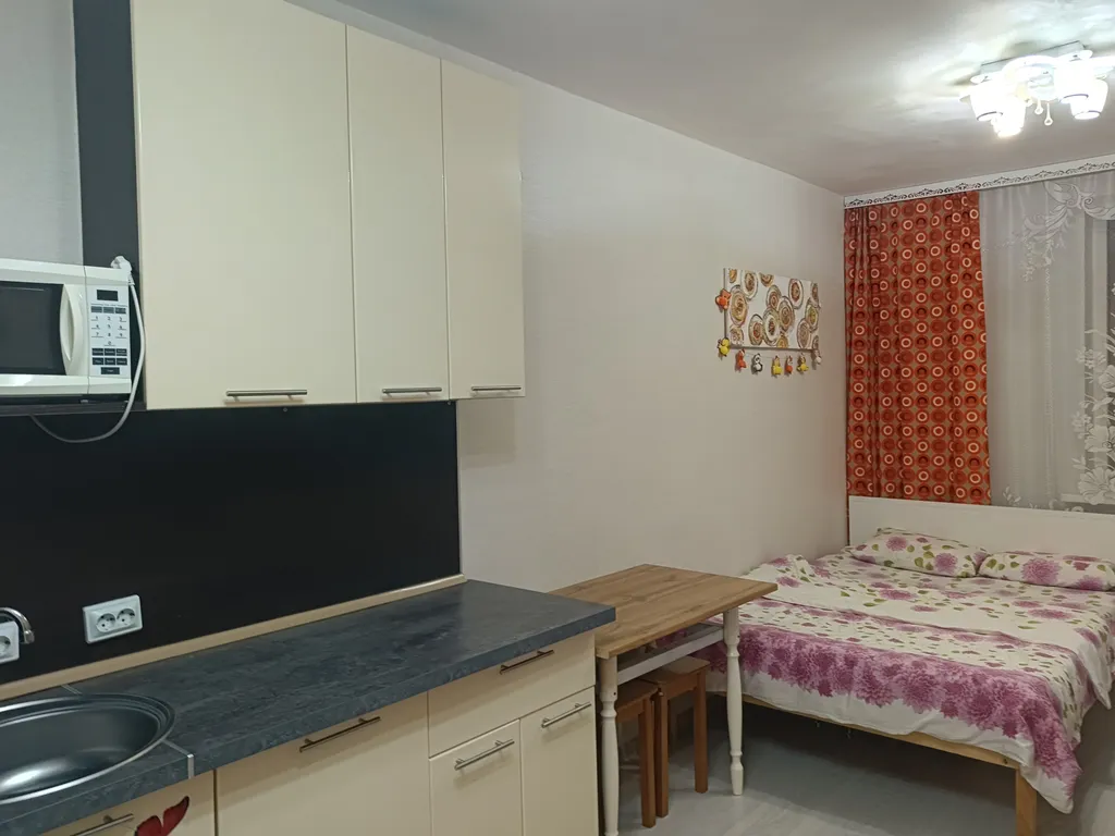 Уютная студия с видом на закат