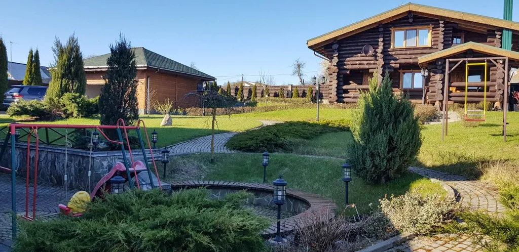 Шале с бассейном и видом на озеро