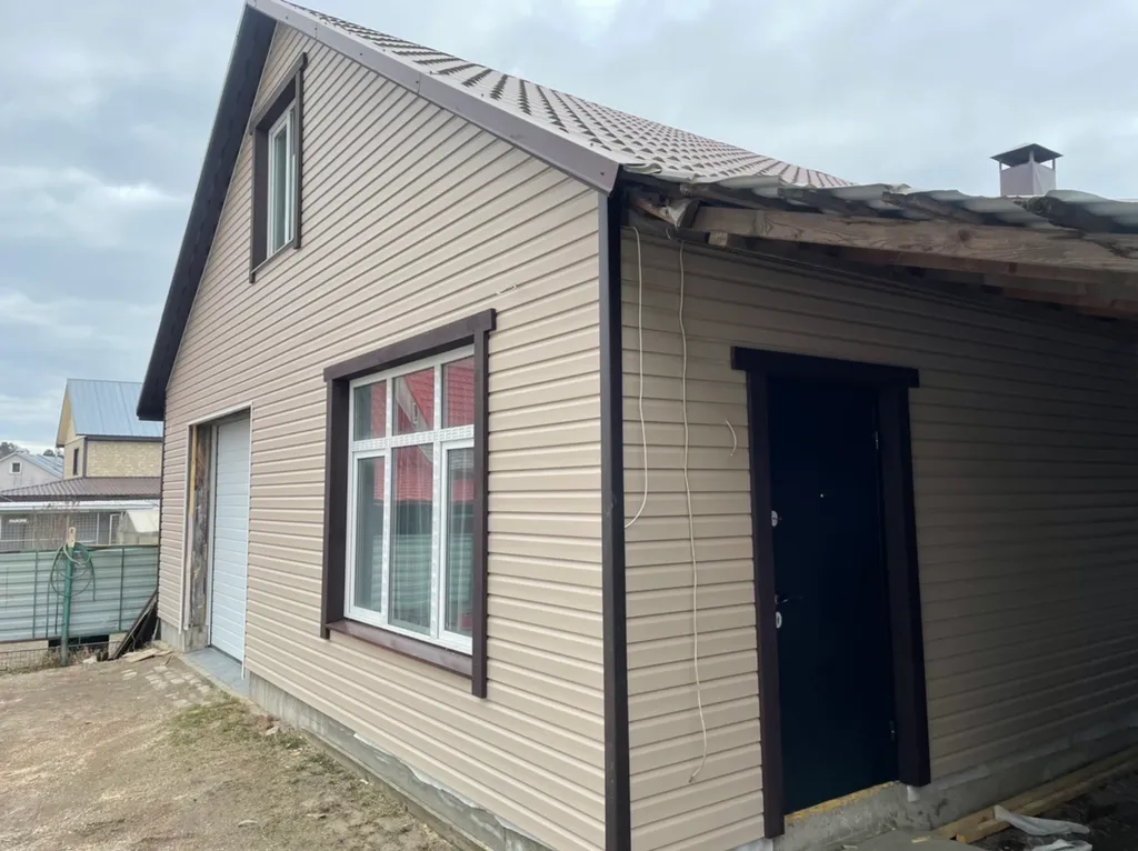 дом  на Выборгском шоссе у озера