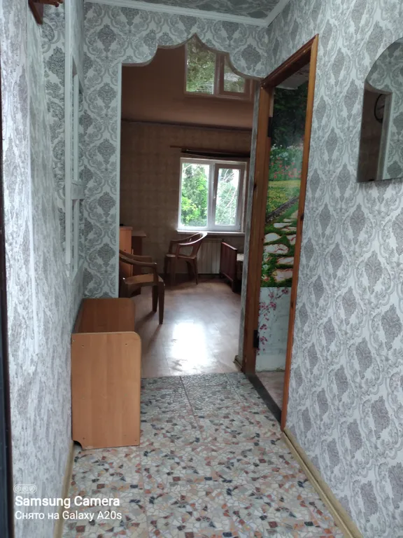 Дом у моря с площадкой в саду