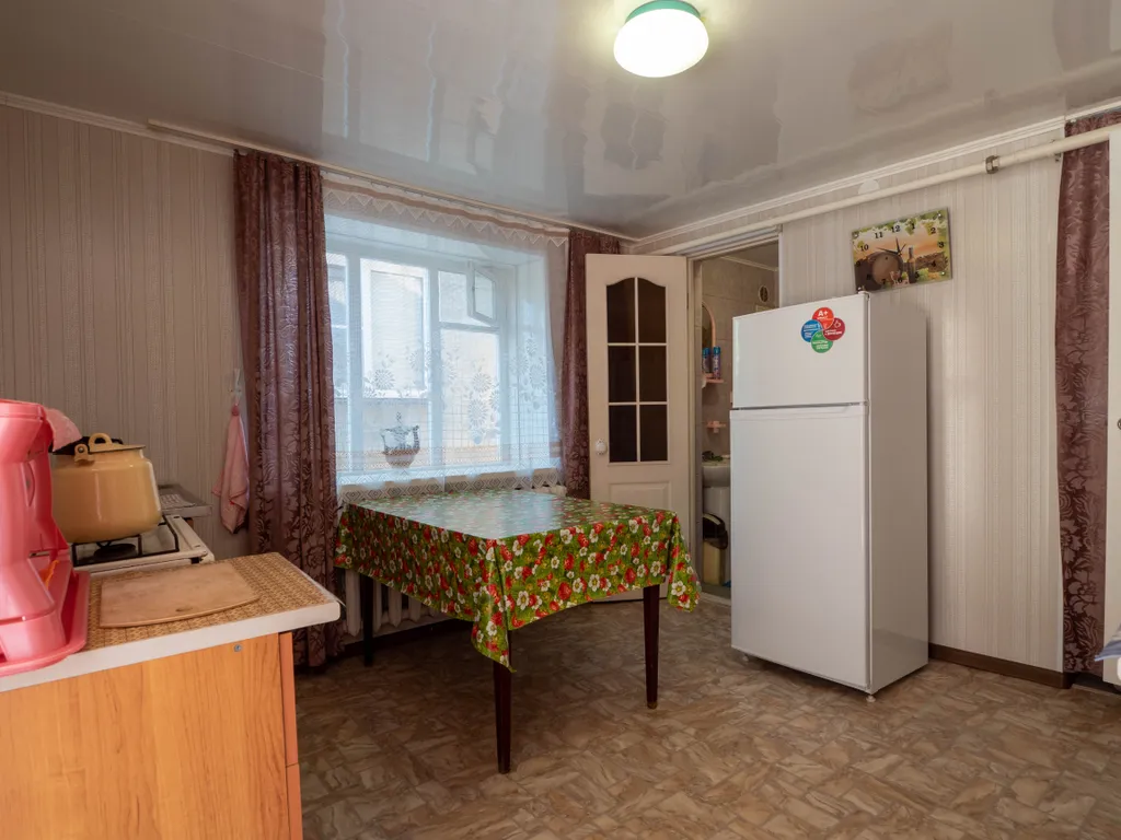 Уютный домик в беседках винограда