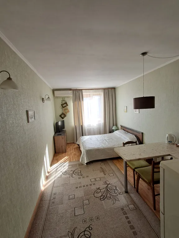 Уютный номер-студия со всеми удобствами в центре