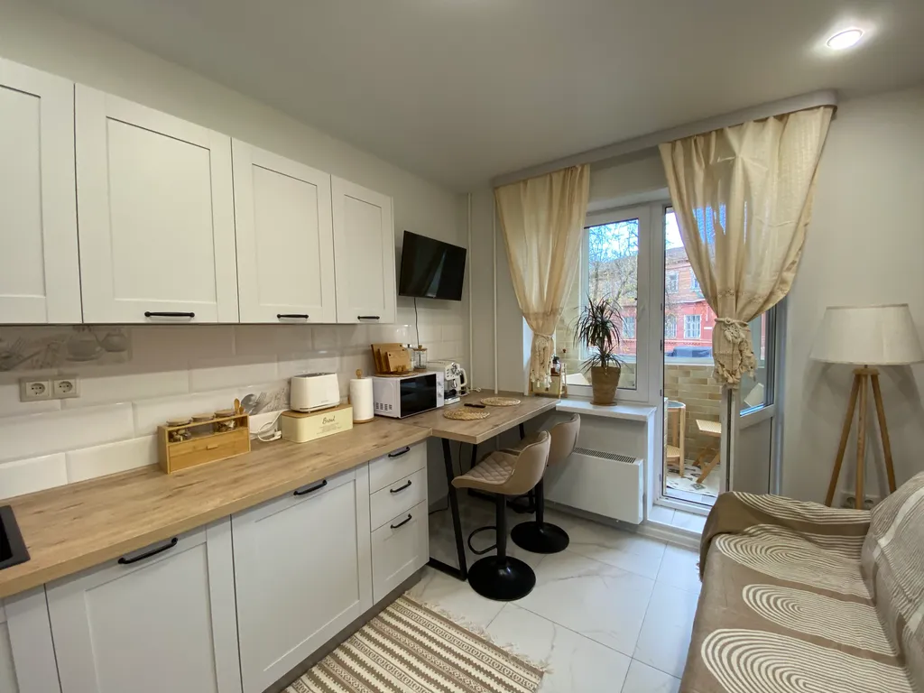 Апартамент Сканди с балконом и отдельной спальней