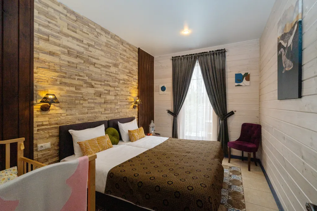 Коттедж Уютный дом с баней и чаном в лесном участке у берега водохранилища — Логиново