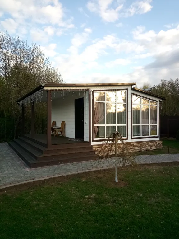 Уютный коттедж с баней и подогреваемой купелью.