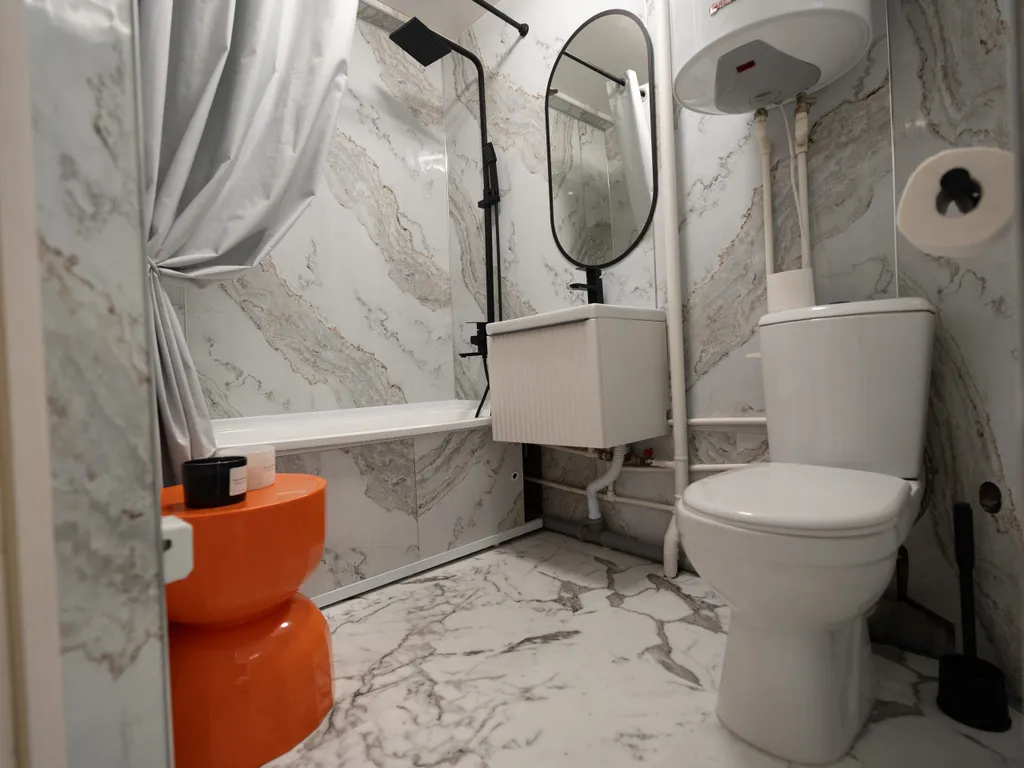 Дизайнерская квартира с видом на горы в центре Домбая