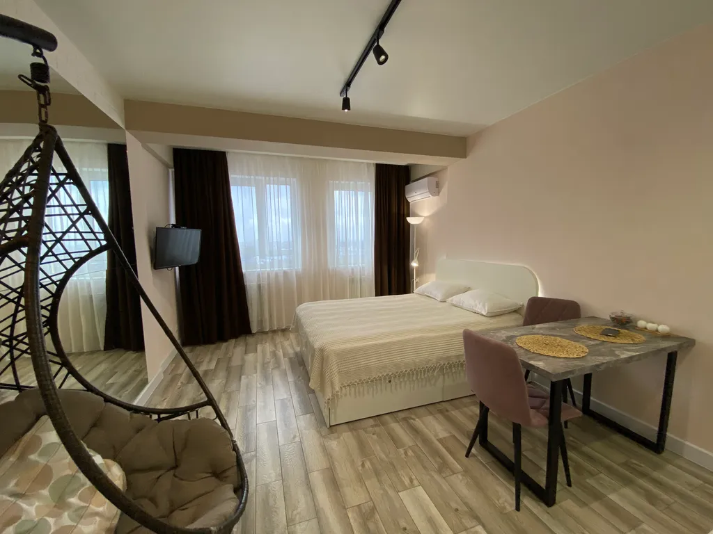 Уютная студия с видом на город