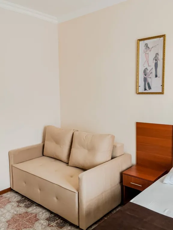 Трехместный номер с балконом