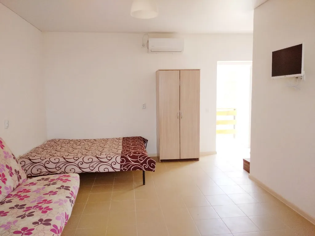 Двухуровневый номер с видом на море