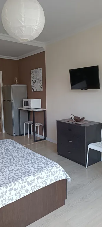 Панорамная студия с видом на горы в самом центре Небуга