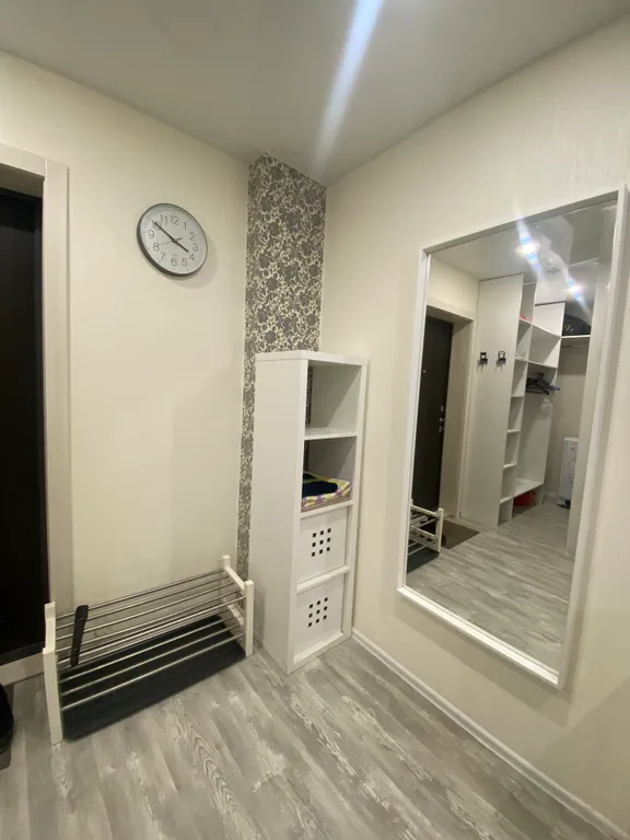 Квартира-студия с панорамным балконом в центре города