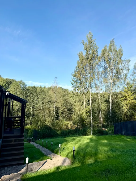 Семейный дом с панорамной сауной и камином